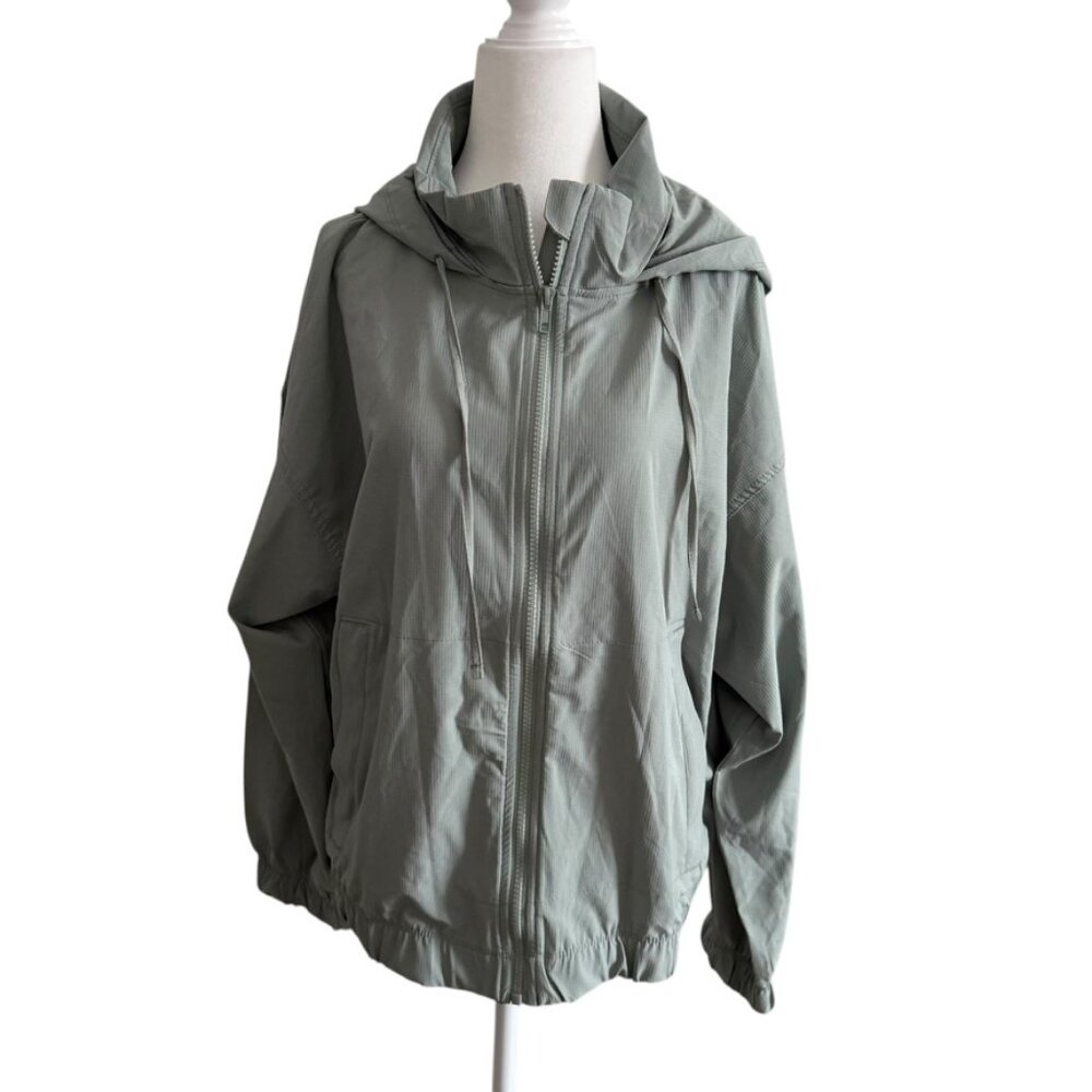 Eddie Bauer NWOT Green Windbreaker Hidden Hood Zipper Jacket Athletic apparel M - Picture 9 of 10